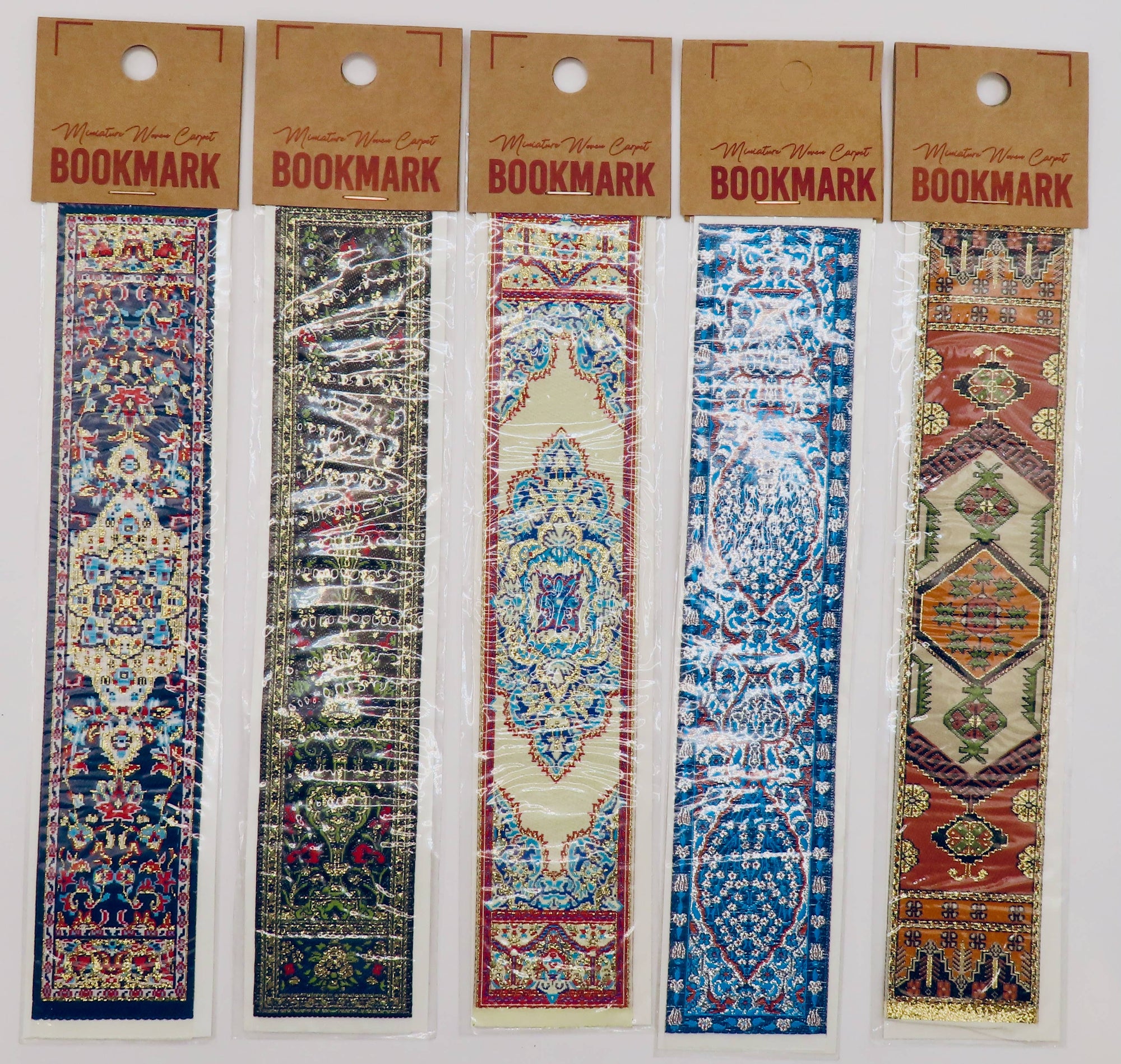 Five Turkish Bookmarks with intricate patterns, resembling Turkish carpets, displayed against a white background.