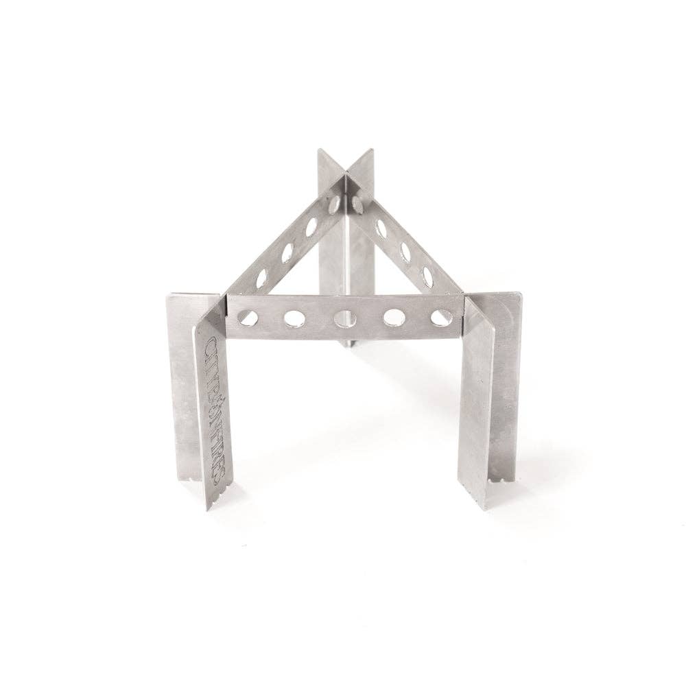 Portable Camp Stove / Stand Combo made of perforated metal strips, assembled in a triangular arch shape, isolated on a white background.