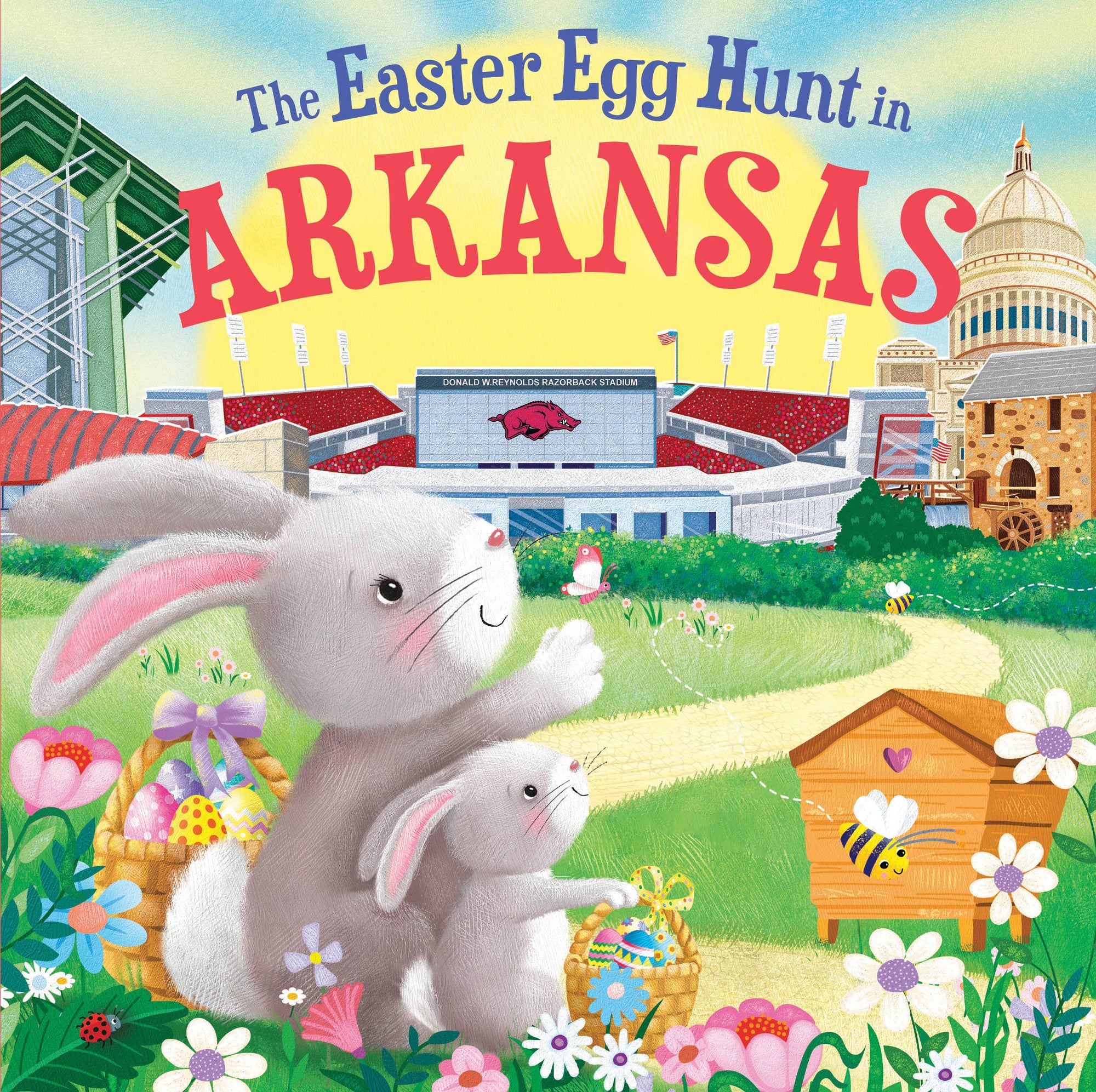 The illustrated cover of "The Easter Egg Hunt in Arkansas" showcases two Little Bunnies holding Easter baskets, set against a backdrop of iconic Arkansas landmarks, with vibrant Easter eggs cleverly hidden among the flowers.