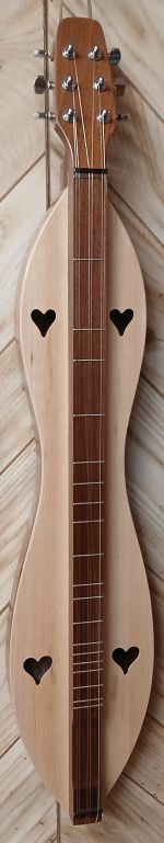 A 6-string, flathead, hourglass dulcimer with walnut back and sides, featuring a spalted, clear or quartersawn top rests elegantly against a wooden background.