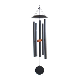 The Shenandoah Melodies® 47-inch Windchime, featuring hand-tuned metal tubes, a wooden clapper, and a circular wind catcher, is a charming garden attraction.