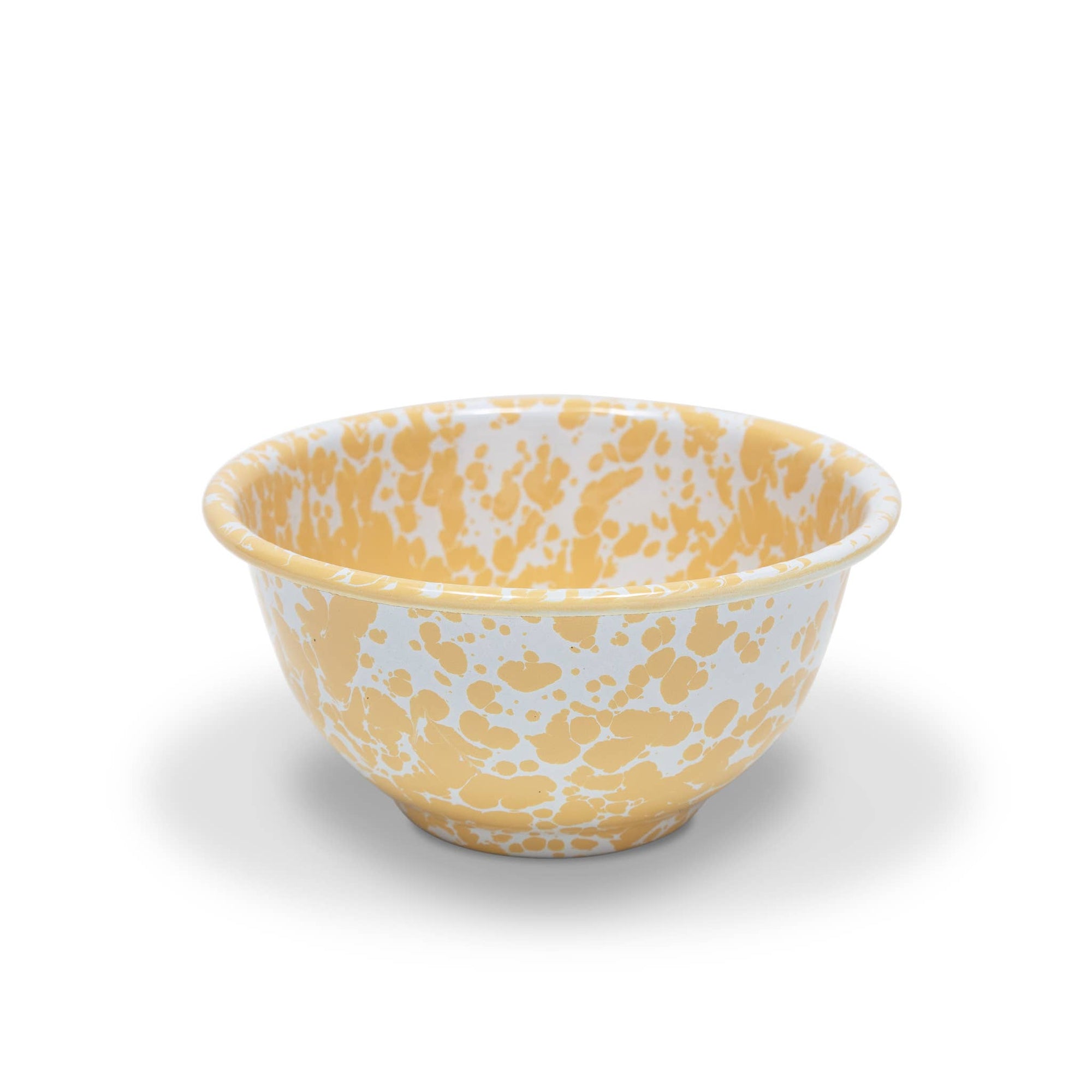 The Splatter Enamelware Small Footed Bowl, featuring a yellow and white speckled design, is perfect for serving dip against a white background.