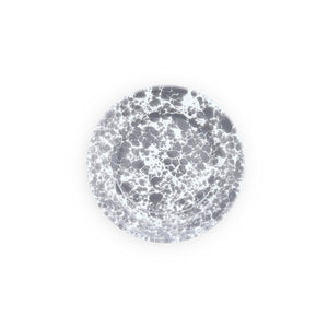 The Splatter Enamelware Flat Salad Plate is a round enamelware plate with a white base and a gray marble-like splatter pattern, shown from above on a plain white background. Its durable cookware design features a smooth porcelain finish that adds both elegance and resilience.
