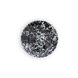 Splatter Enamelware Flat Salad Plate featuring a black and white splatter pattern, showcased from above on a plain white background. Its porcelain enamel finish brings elegance to the plate, while the sturdy enamelware construction ensures enduring quality.