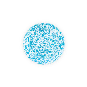 The Splatter Enamelware Flat Salad Plate, featuring a round white design with classic blue speckled patterns, is centered on a plain white background.