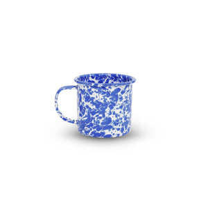 The Splatter Enamelware 12 oz Mug, featuring a blue and white speckled design and handle, is shown on a plain white background.