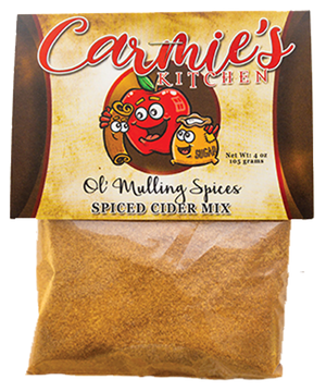 Bag of Carmie's Kitchen Mulling Spices, net weight 4 oz, featuring a decorative label with cartoon fruit characters. Enhanced with Saigon cinnamon, it makes a perfect holiday gift or delightful beverage addition.