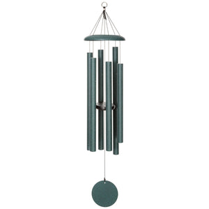 The Corinthian Bells® 44-inch Windchime features six metal tubes of varying lengths hanging from a round top, adding a touch of flair and depth to any space, complete with a circular wind catcher at the bottom.