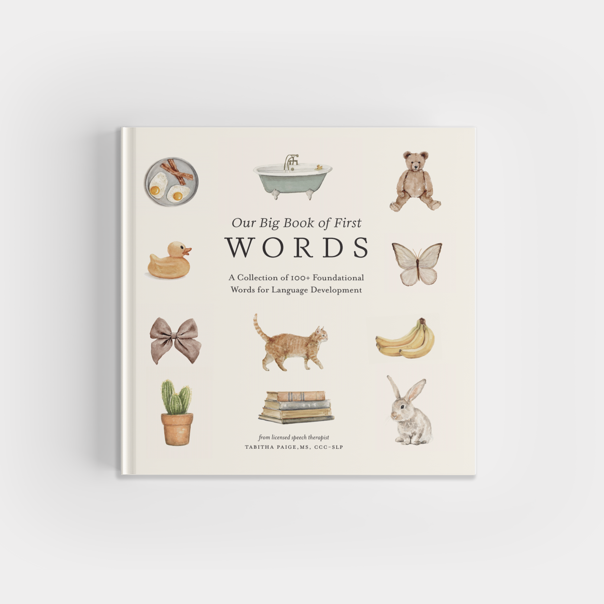 Cover of a children's book titled "Our Big Book Of Words," curated by a speech-language pathologist, featuring illustrations of a bathtub, teddy bear, butterfly, bananas, bunny, cactus, bow, rubber duck, and plate of soup. Perfect for expanding your child's vocabulary!