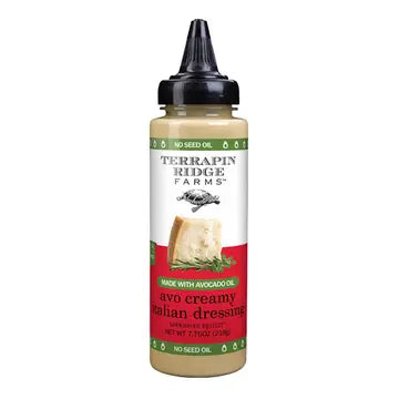 A bottle of Terrapin Ridge Avo Creamy Italian Dressing, with avocado oil, featuring a black cap and a red and white label.