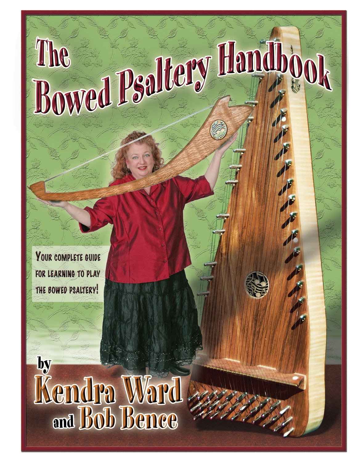 A woman plays a bowed psaltery on the cover of the "Bowed Psaltery Handbook by Kendra Ward & Bob Bence.