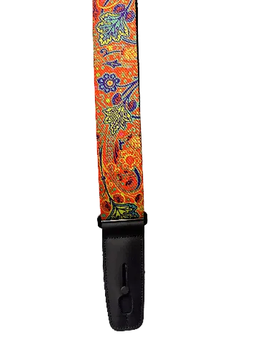 The Lock-It Bob Masse Series Orange Strap features a vibrant paisley pattern in orange, yellow, and blue with a black leather end.