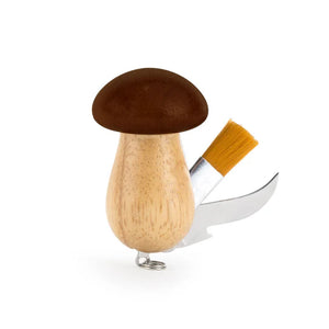 A creative depiction of a Mushroom Tool Keychain, with its stem as the handle of a pocket knife, which includes a blade and a bandage attached.