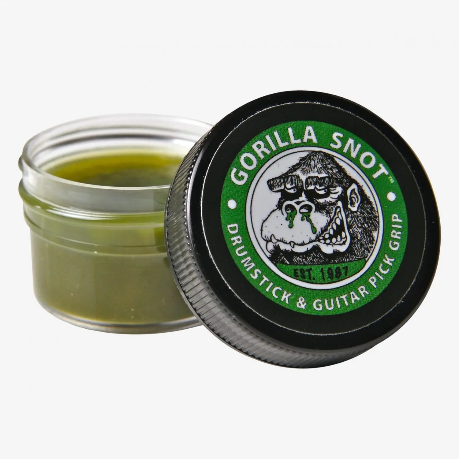 Open jar of Gorilla Traction Gel, a green gripping aid for drumstick and guitar pick grip, with its lid showing a gorilla logo next to it.