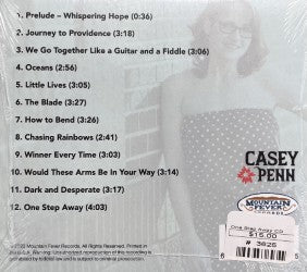 A CD back cover showcasing the tracklist of 12 songs from Casey Penn's album "One Step Away," complete with pricing and barcode details.