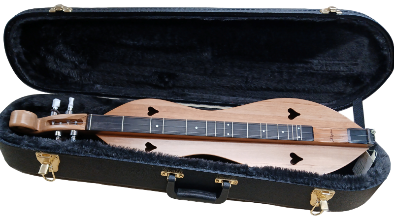A Premier GINGER Dulcimer rests in a black, plush-lined Premier GINGER Dulcimer Hard Case UPGRADE with gold latches, included when buying a new dulcimer.
