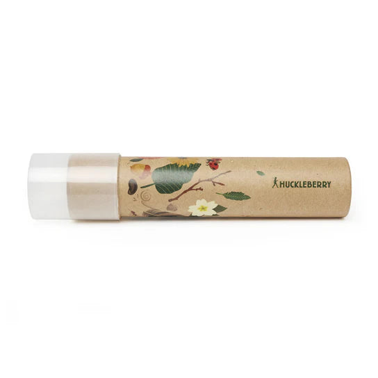 A Huckleberry Kaleidoscope in a cardboard tube adorned with floral and leaf designs, featuring a clear plastic cap and a touch of whimsy for young artisans.