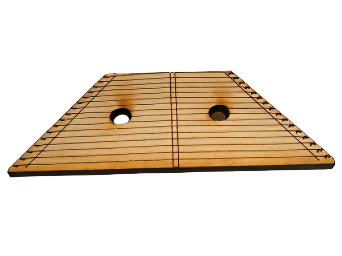 The Hammered Dulcimer Wooden Magnet features a trapezoidal shape with two round sound holes and multiple parallel strings across its surface.