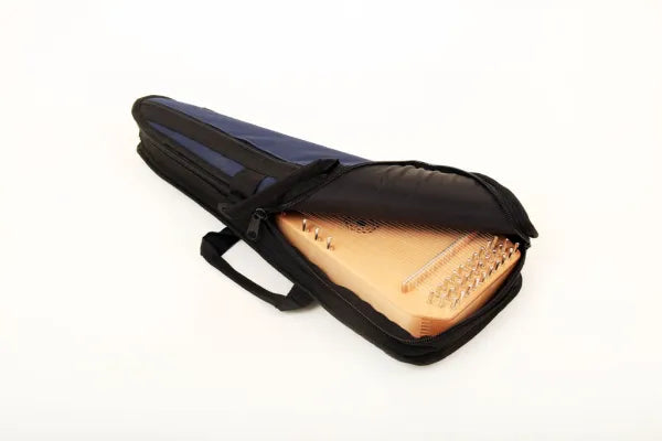 A foam-padded protective Master Works Bowed Psaltery Case containing a Master Works Bowed Psaltery.