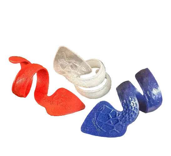 Three SnakePick spiral-shaped plastic wristbands—red, white, and blue—are displayed on a black background. Each features a textured, embossed pattern on its wider end.