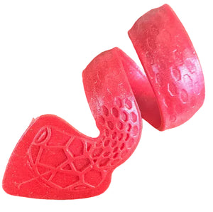 The SnakePick is a red, spiral-shaped gummy candy featuring hexagonal and geometric patterns on its surface, displayed on a wooden background.