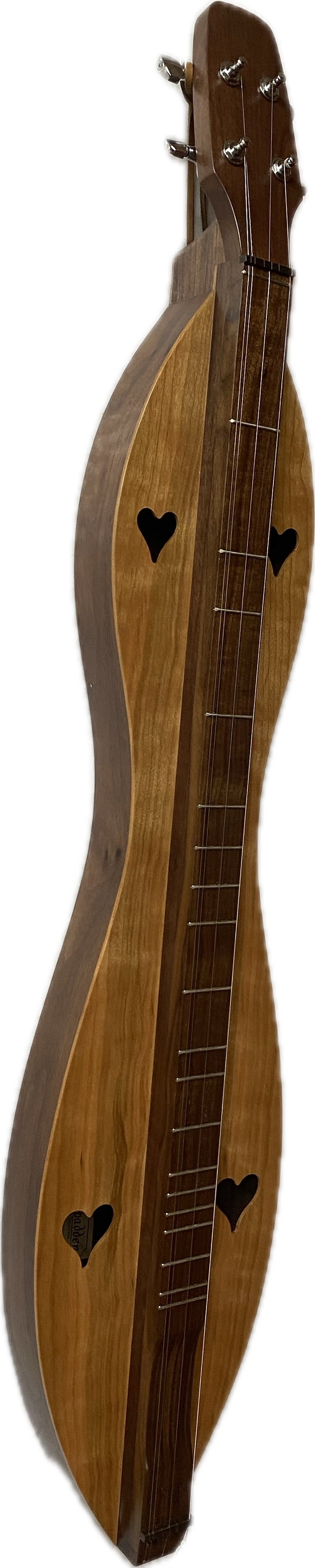 Handcrafted McSpadden Appalachian dulcimer featuring four strings and an hourglass shape, with heart-shaped sound holes, a walnut back, and cherry sides and top.