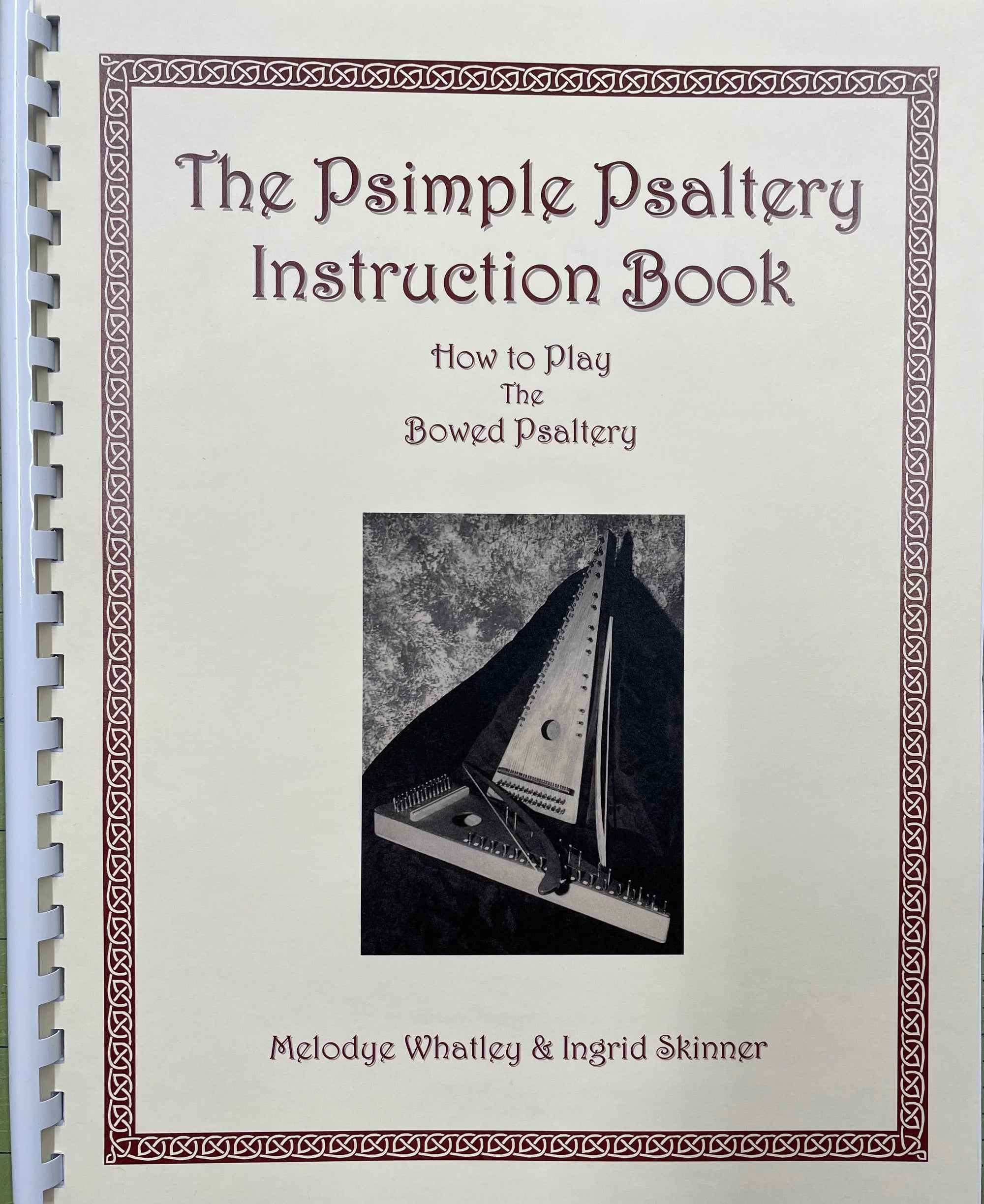 An instruction book titled "The Psimple Psaltery" by Melodye Whatley & Ingrid Skinner, featuring the image of a bowed psaltery on the cover.