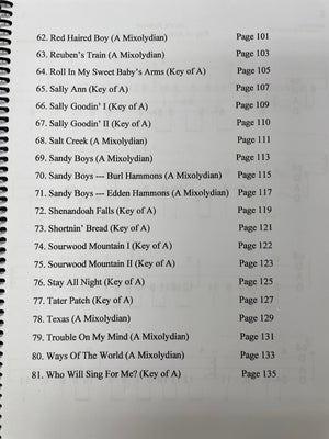 A handwritten list of old-time tunes with their corresponding musical keys and page numbers, all tabbed for dulcimer, on a lined paper. DAD Capo 4 by Tom Arnold.