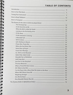 Spiral-bound book open to the table of contents. Chapters include introductions, instructions, and a list of hymns and gospel favorites like “The Cloudy Day,” “In the Sweet By and By,” and “I’ll Fly Away.” Also features musical notation and tablature for traditional noter-style dulcimer. The product is titled *Sunday Sunrise! by Kendra Ward and Bob Bence*.