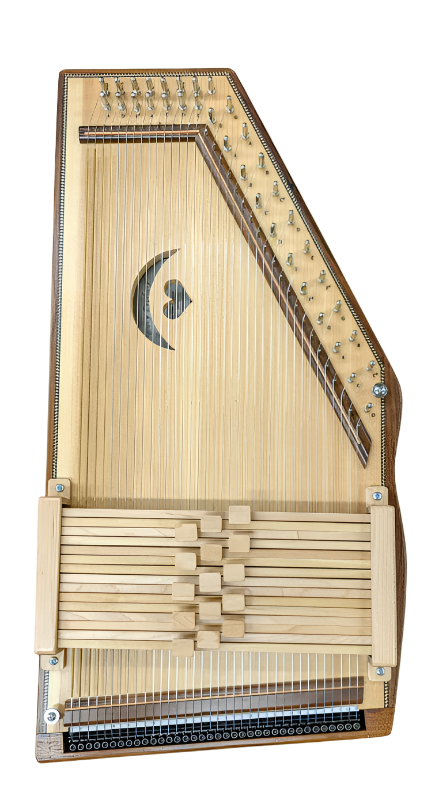 The Evoharp Legacy 15 Bar autoharp is displayed on a light-colored surface, featuring multiple tuning pegs, strings, chord bars, and includes a case.