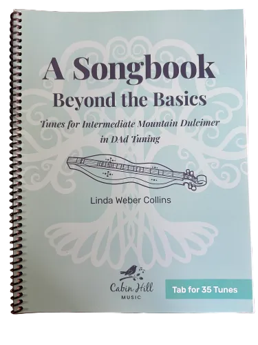 Beyond the Basics: A Song Book by Linda Collins, 2nd Edition is a spiral-bound collection for mountain dulcimer players in D-A-d tuning—ideal for intermediates looking to expand their musical repertoire.