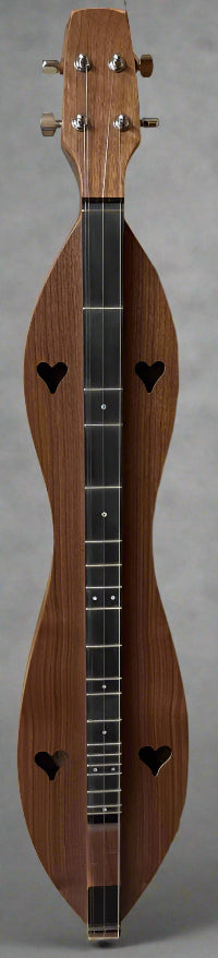 An Appalachian dulcimer with heart-shaped sound holes features a fretboard adorned with Mother of Pearl Inlay Fret Dots - INSTALLED, resting elegantly on a wooden surface.