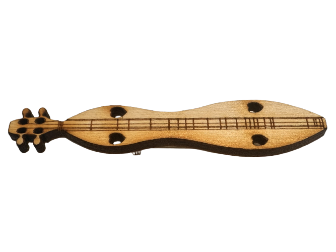 The Mountain Dulcimer Wooden Pin is a small wooden pin shaped like a string instrument with three strings and dark round markings, resembling a miniature dulcimer.