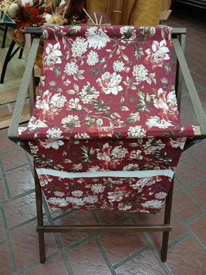 Sling Music Stand featuring a handmade folding wooden frame and a fabric sling with a red floral pattern.