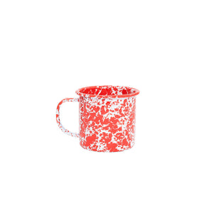 The Splatter Enamelware 12 oz Mug, featuring a red and white speckled design and a sturdy handle, is displayed against a plain white background.