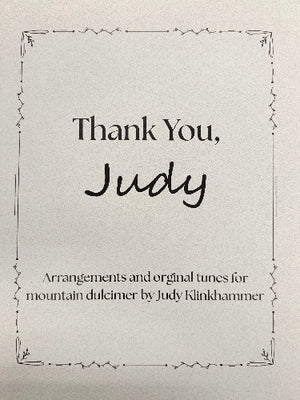 Cover page for “Thank You, Judy - Judy Klinkhammer” featuring the text: “Thank You, Judy. Arrangements and original tunes for mountain dulcimer by Judy Klinkhammer,” surrounded by a decorative border that echoes the artistry of her mountain dulcimer arrangements.
