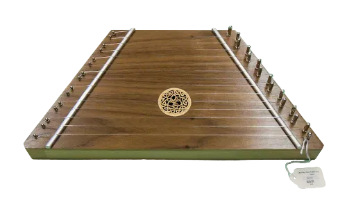 The Lap Harp Walnut with Celtic Knot is a trapezoidal folk instrument with tuning pegs on both sides and a central sound hole decorated with a Celtic knot design.