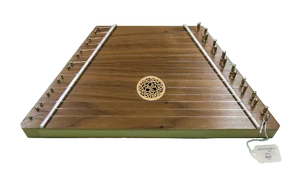 The Lap Harp Walnut with Celtic Knot is a trapezoidal folk instrument with tuning pegs on both sides and a central sound hole decorated with a Celtic knot design.