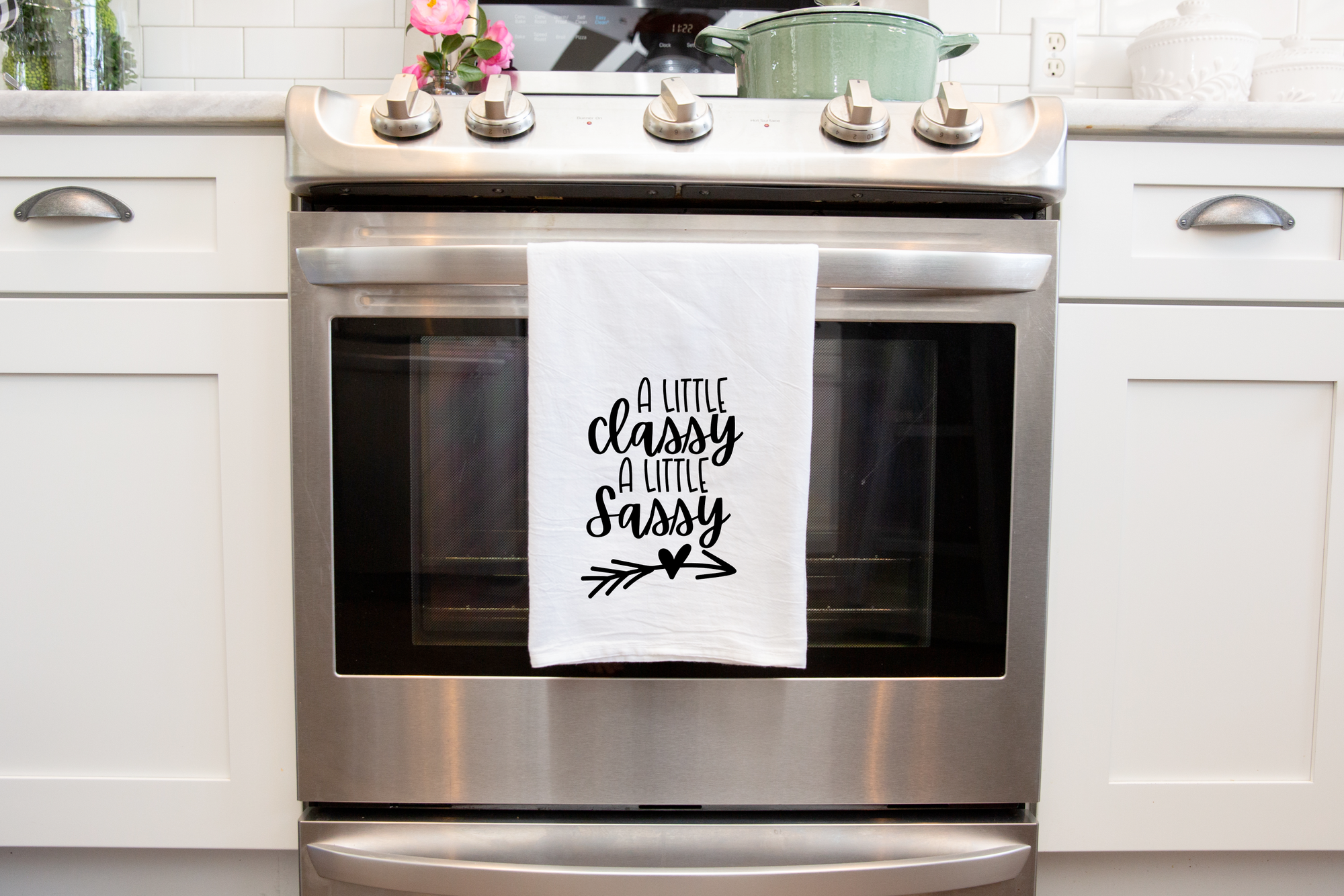 A Classy Sassy Tea Towel with the words 'all days are busy' on it.