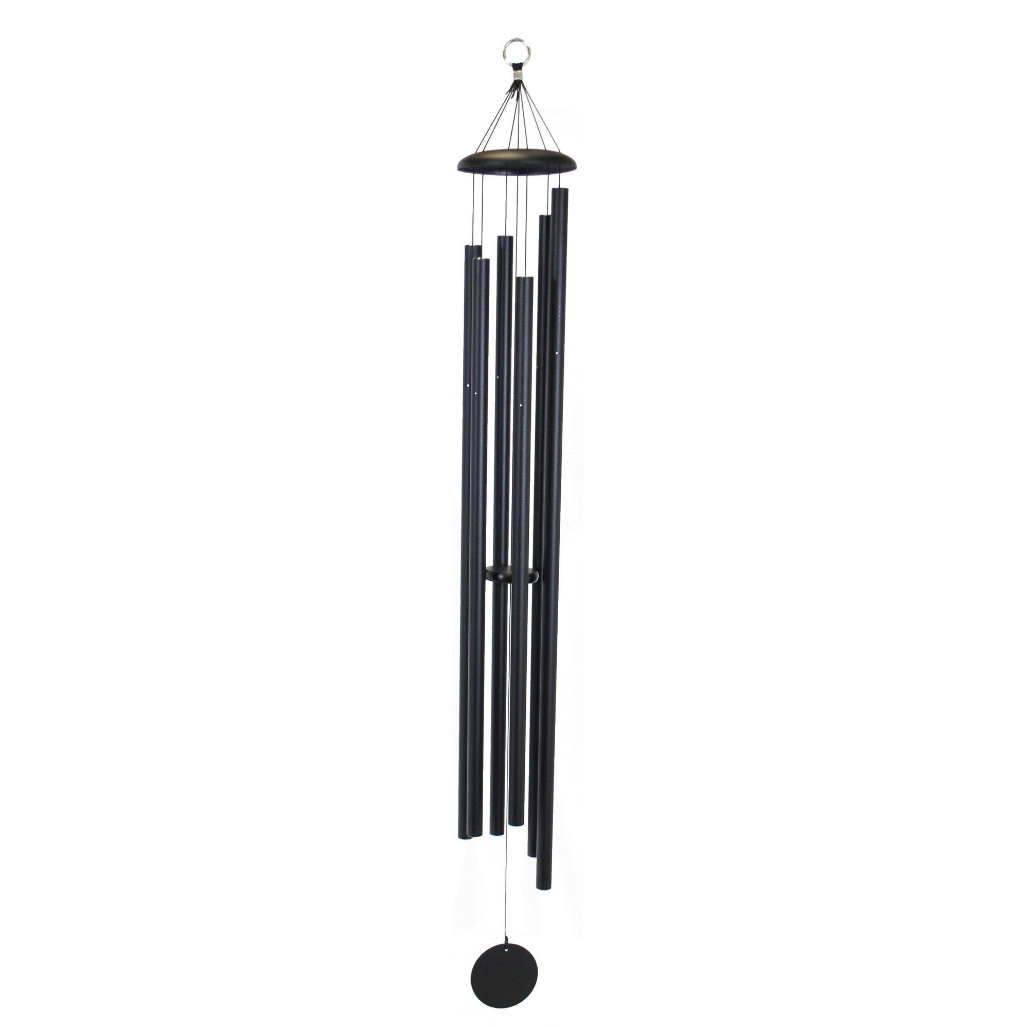 A peaceful retreat enhanced by a Corinthian Bells® 74-inch Windchime gently swaying in a backyard.