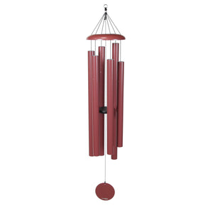The Corinthian Bells® 65-inch Windchime - Wholesale features several red metal tubes hanging from a circular top with black cords and a round wind catcher, creating a deep, resonant sound.