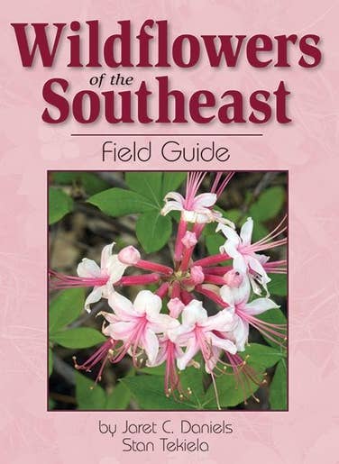 Book cover titled "Wildflowers of Southeast Field Guide" by Jaret C. Daniels and Stan Tekiela, featuring a photograph of pink and white wildflowers.