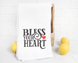 Embrace your Southern pride with this charming Bless Your Heart Tea Towel.