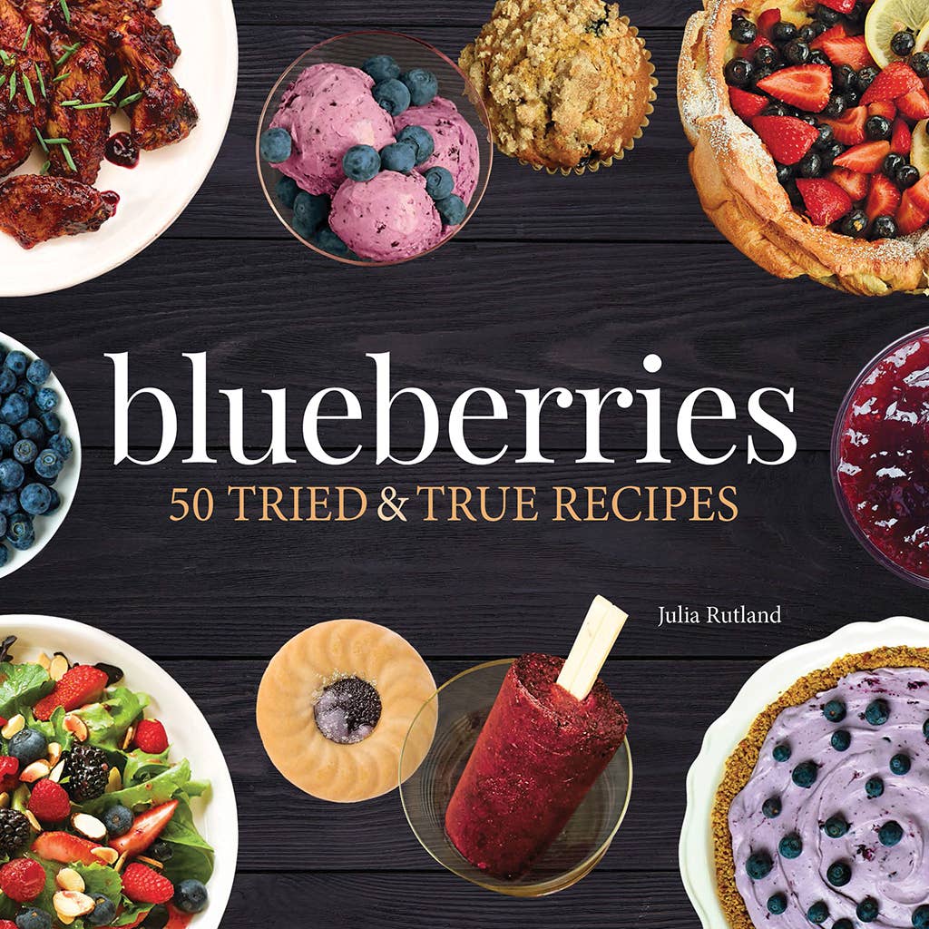 A cookbook cover titled "Blueberries Cookbook" by Julia Rutland, featuring images of various blueberry dishes like pies, salads, and desserts including Blueberry Cheesecake