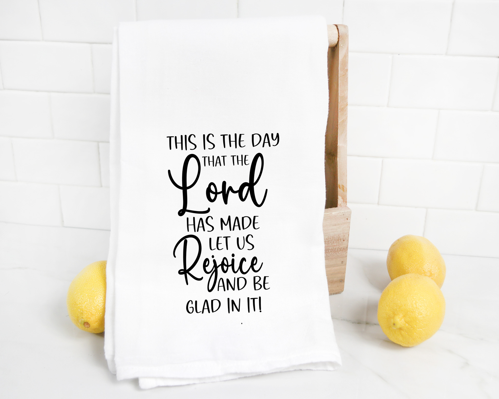 The discontinued Psalm 118 Tea Towel features "This is the day that the Lord has made let us rejoice and be glad in it!" in black print and comes with three lemons—an ideal Christian gift for a Sunday School teacher or loved one.