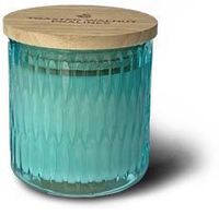 The Cathedral Glass Tumbler Swan Creek Candle features a blue glass jar with a textured finish and a round wooden lid.