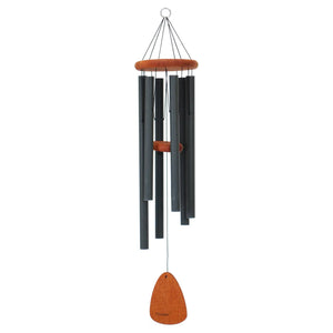 The Festival® 42-inch Windchime features black metal tubes, a wooden top, striker, and wind catcher, suspended by a thin string—ideal as a decorative garden chime and centerpiece for your outdoor space.