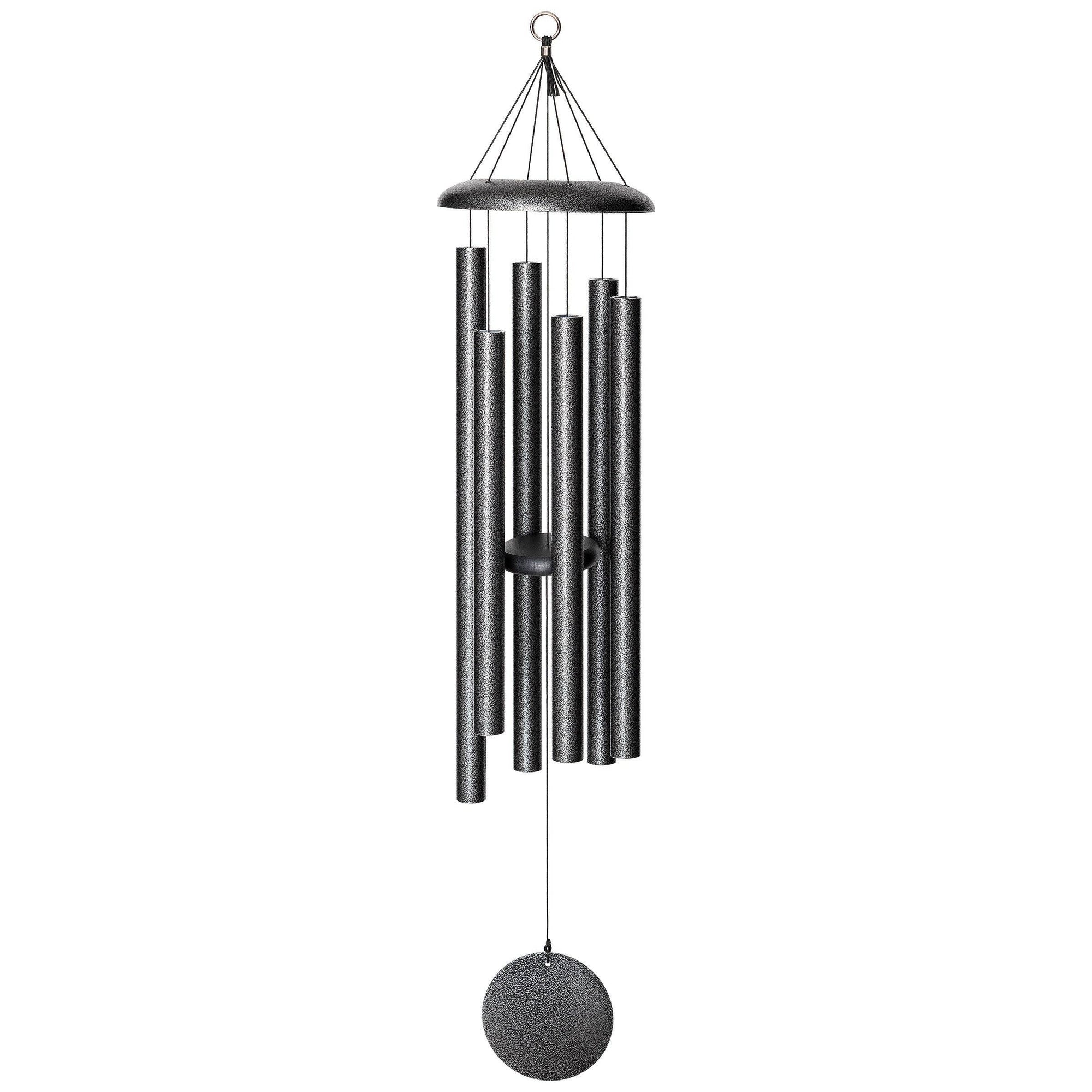 Corinthian Bells® 44-inch Windchime, featuring multiple cylindrical tubes and a circular clapper, hangs elegantly by strings from a small ring. This black wind chime adds depth and flair to any space.