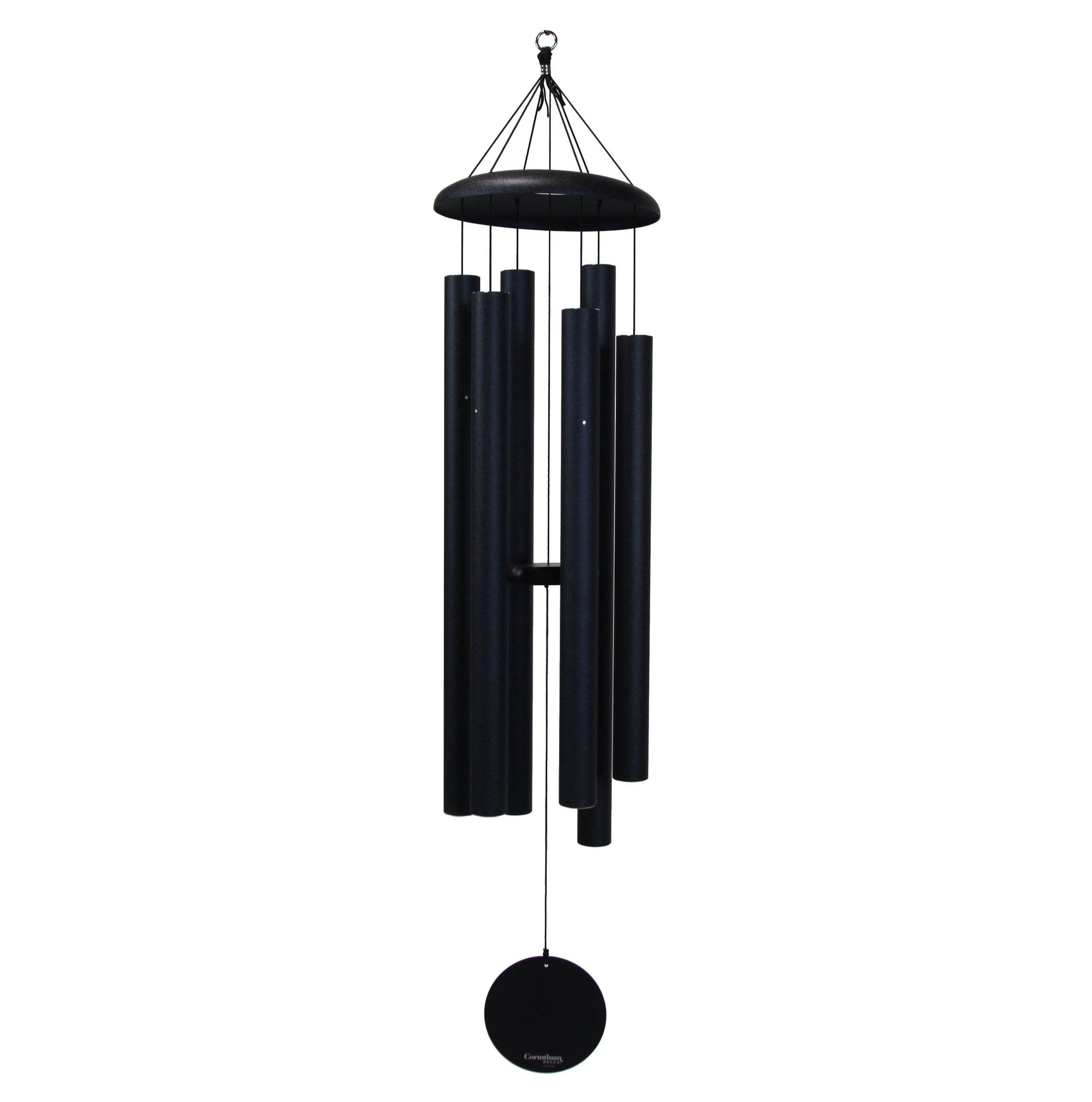 The Corinthian Bells® 60-inch Windchime, featuring multiple black cylindrical chimes and a round striker that produce the harmonious tones of a major 7th chord, is suspended from a hook by strings.