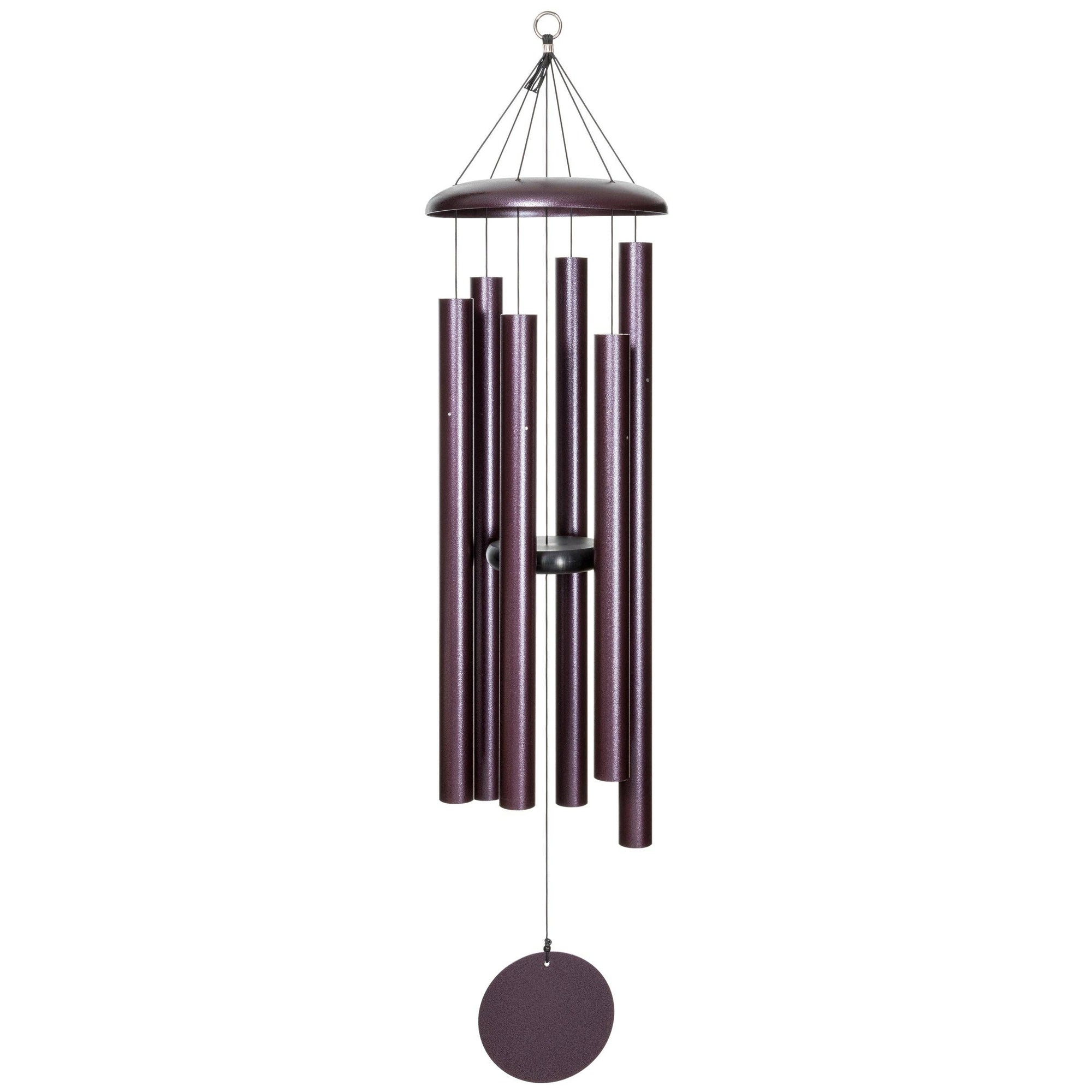 A Corinthian Bells® 50-inch Windchime hanging on a white background, producing soothing tones when it chimes.